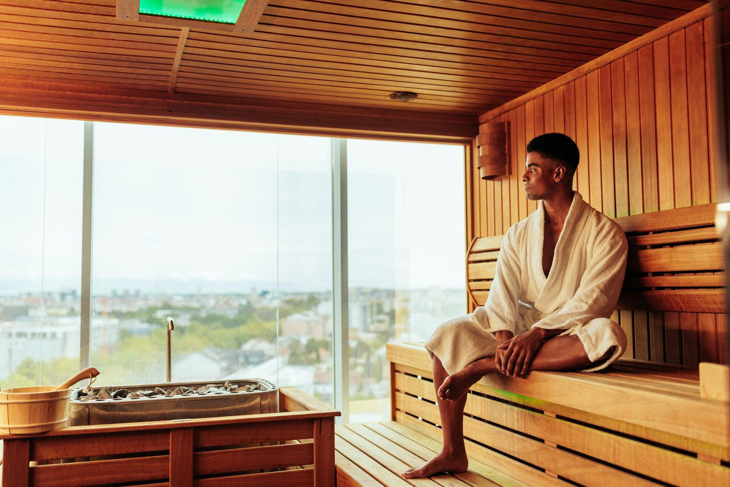 A man sitting in a luxurious sauna